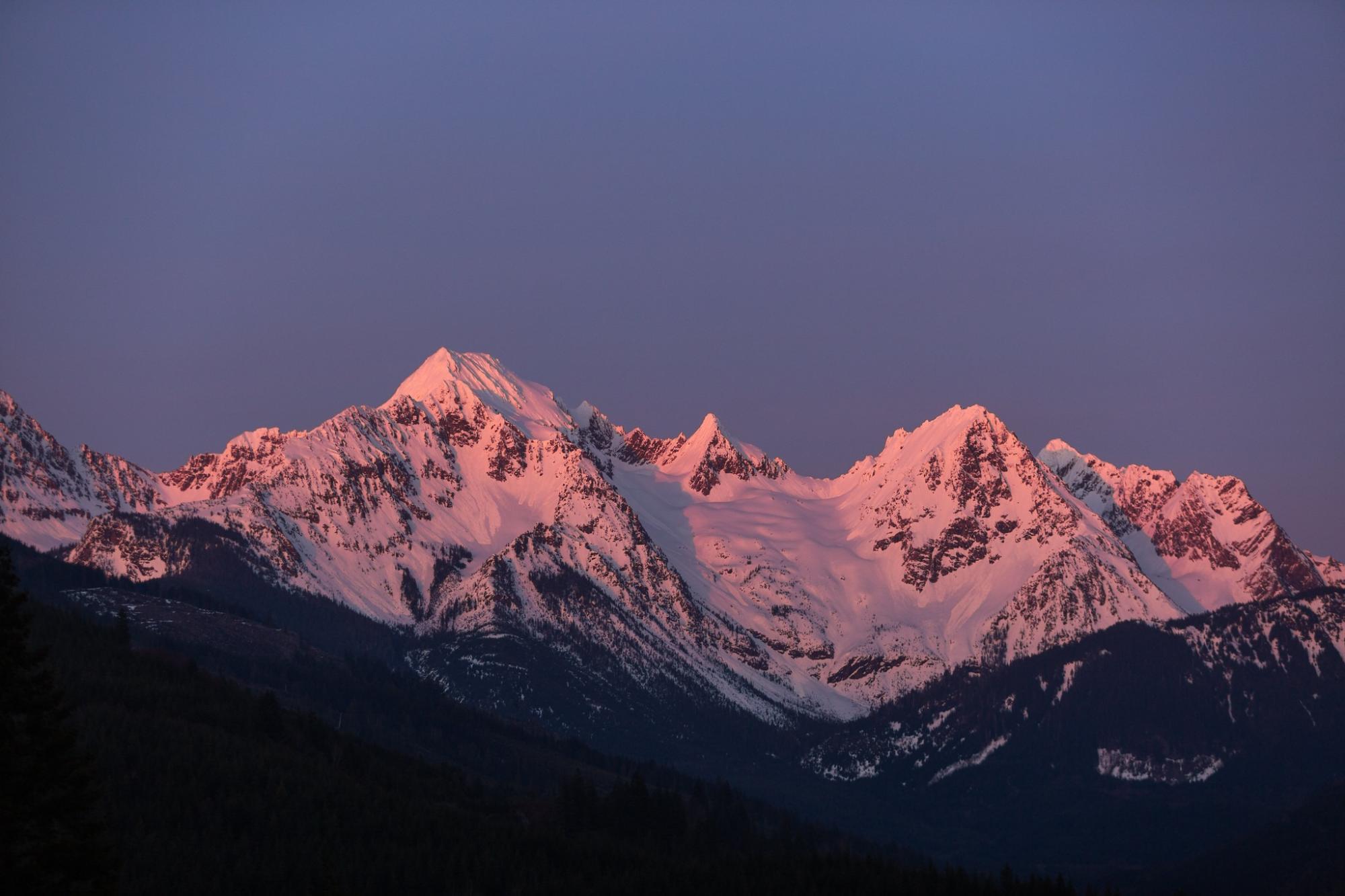 Alpine glow on mountain range at sunset